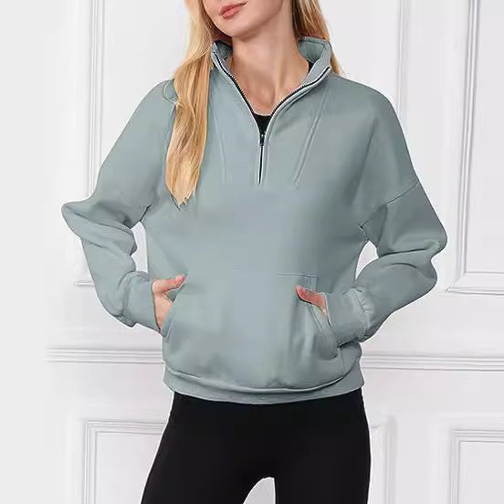 Kvinnor sportig halvdragkedja sweatshirt med praktiska fickor Mirla-Eva Jonsson