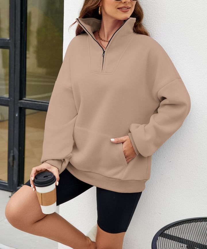 Kvinnor sportig halvdragkedja sweatshirt med praktiska fickor Mirla-Eva Jonsson