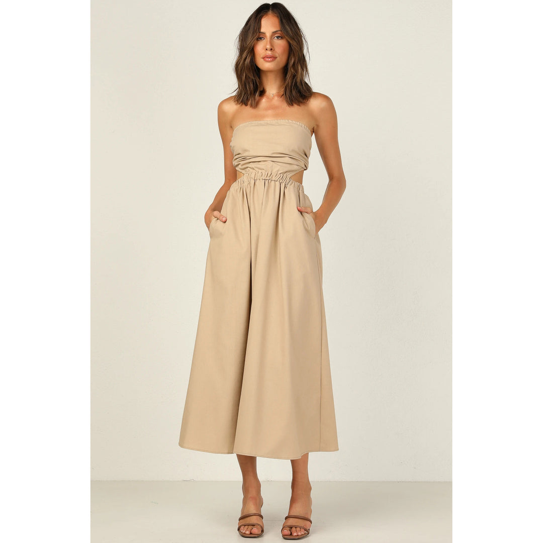 Kvinnor strapless maxi klänning med sidoklipp och praktisk fickdesign Mirla-Eva Jonsson