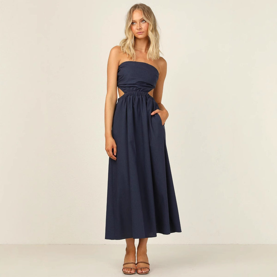 Kvinnor strapless maxi klänning med sidoklipp och praktisk fickdesign Mirla-Eva Jonsson