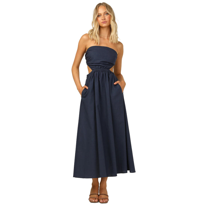 Kvinnor strapless maxi klänning med sidoklipp och praktisk fickdesign Mirla-Eva Jonsson