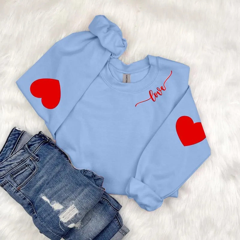 Kvinnor sweatshirt med hjärtformad design och avslappnad passform Mirla-Eva Jonsson