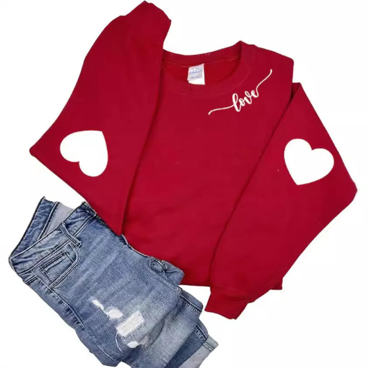 Kvinnor sweatshirt med hjärtformad design och avslappnad passform Mirla-Eva Jonsson