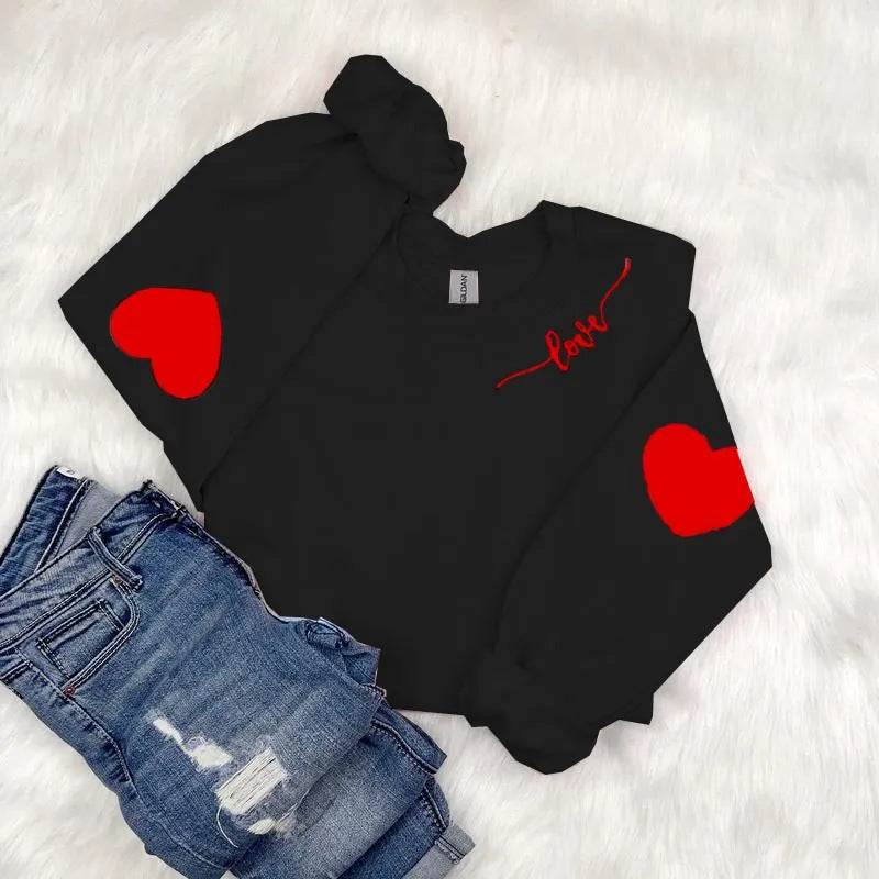 Kvinnor sweatshirt med hjärtformad design och avslappnad passform Mirla-Eva Jonsson