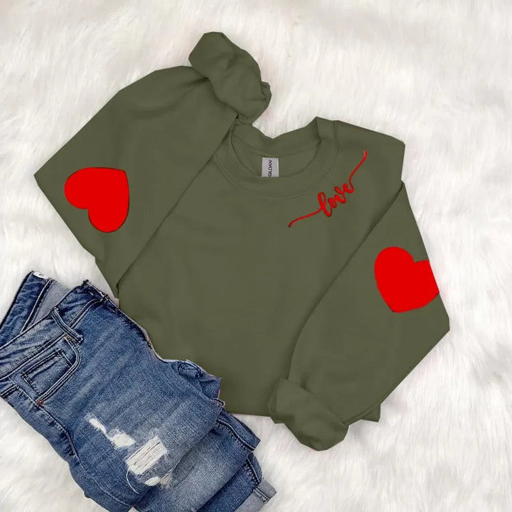 Kvinnor sweatshirt med hjärtformad design och avslappnad passform Mirla-Eva Jonsson