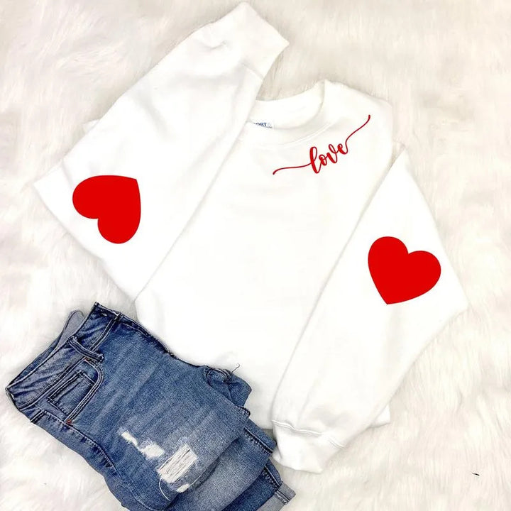 Kvinnor sweatshirt med hjärtformad design och avslappnad passform Mirla-Eva Jonsson