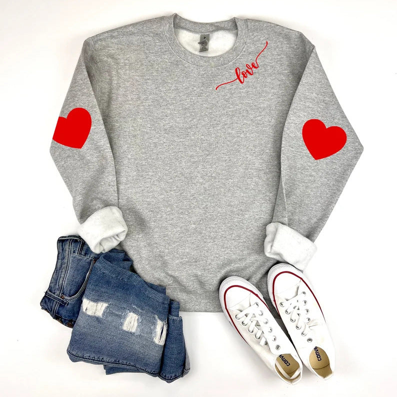 Kvinnor sweatshirt med hjärtformad design och avslappnad passform Mirla-Eva Jonsson