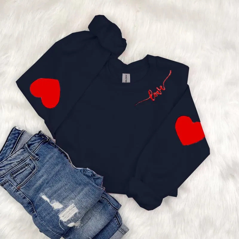 Kvinnor sweatshirt med hjärtformad design och avslappnad passform Mirla-Eva Jonsson