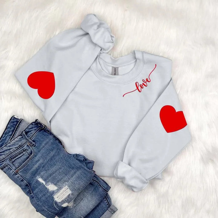 Kvinnor sweatshirt med hjärtformad design och avslappnad passform Mirla-Eva Jonsson