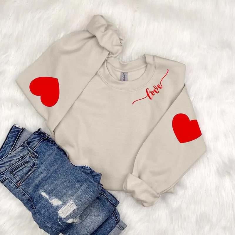 Kvinnor sweatshirt med hjärtformad design och avslappnad passform Mirla-Eva Jonsson
