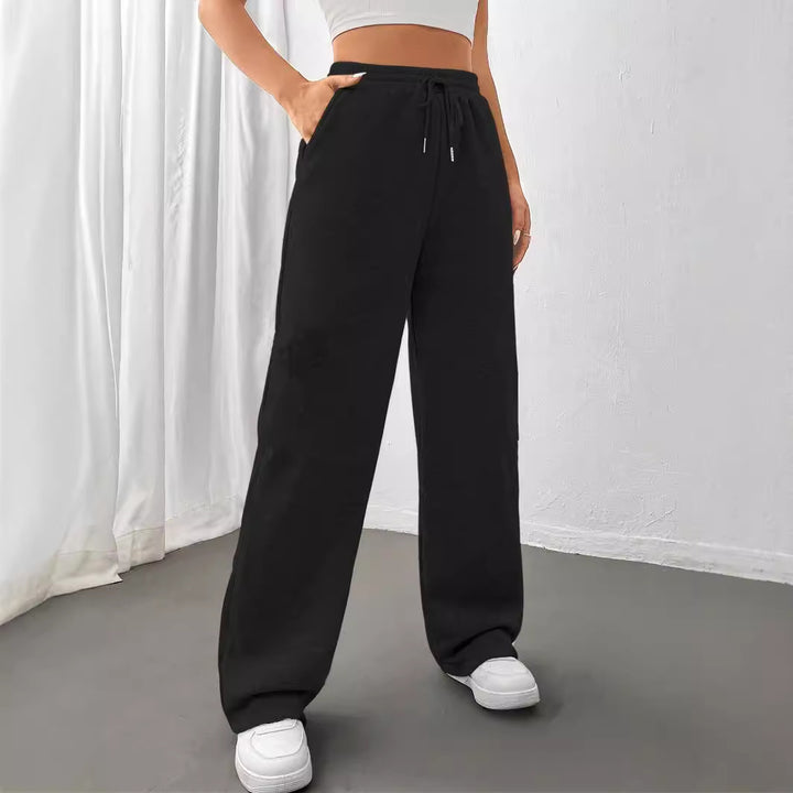 Kvinnor vida fritids-joggingbyxor med elastisk midja och praktiska fickor Mirla-Eva Jonsson