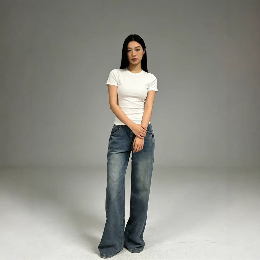 Kvinnor vida högmidjade jeans med avslappnad passform och individuella tvättar Mirla-Eva Jonsson