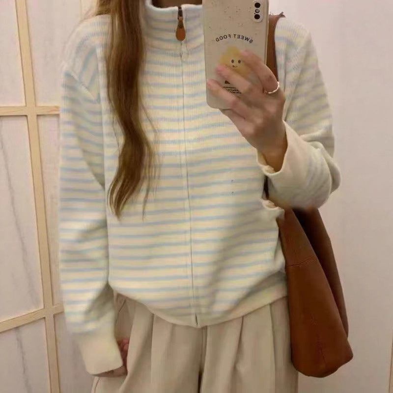 Kvinnors ¼-zip quiltad pullover med fin randtextur Mirla-Eva Jonsson