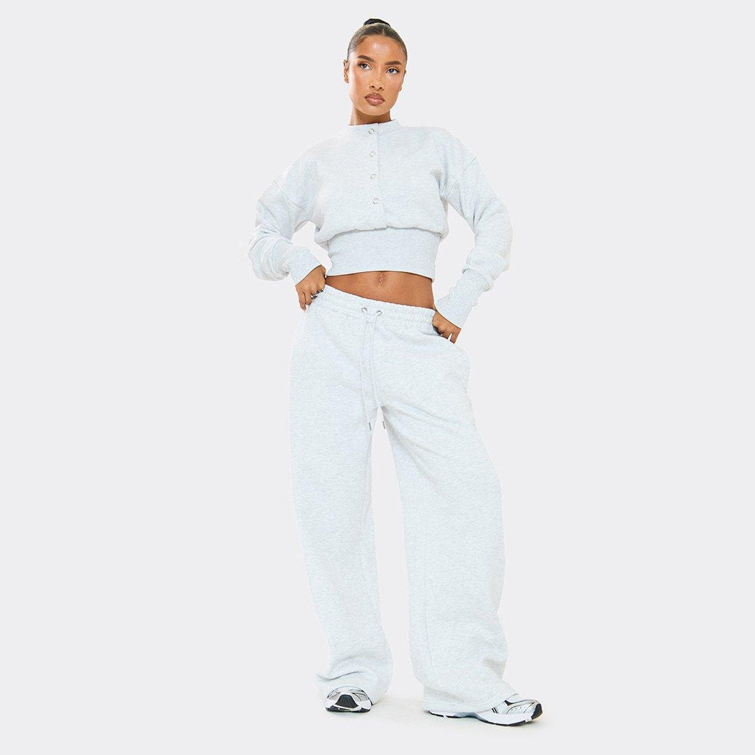 Kvinnors Bekväma Croppad Sweatshirt och Lösa Träningsbyxor Set Mirla-Eva Jonsson