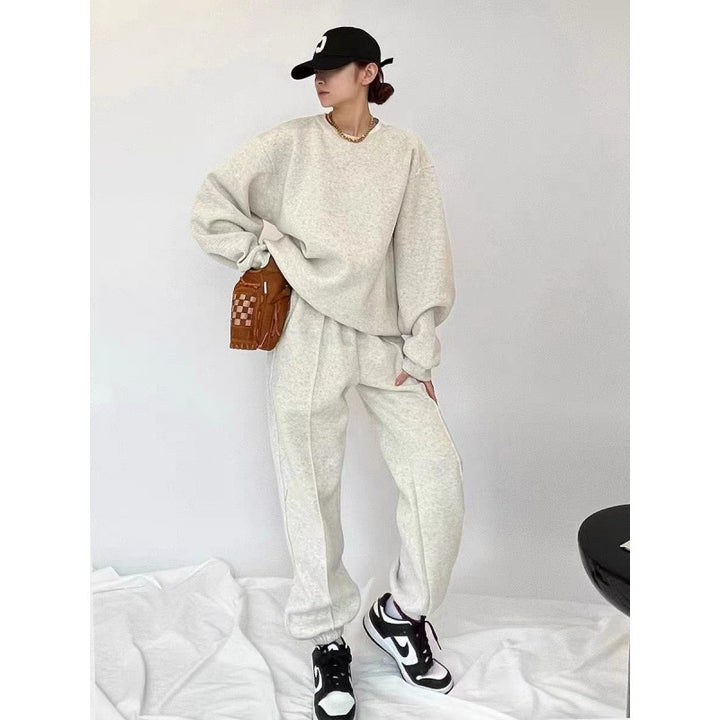 Kvinnors Bekväma Oversized Sweatshirt och Jogger Set med Elastiskt Midjeband och Sidofickor Mirla-Eva Jonsson