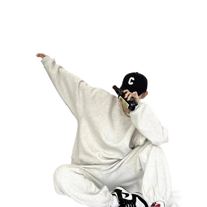 Kvinnors Bekväma Oversized Sweatshirt och Jogger Set med Elastiskt Midjeband och Sidofickor Mirla-Eva Jonsson