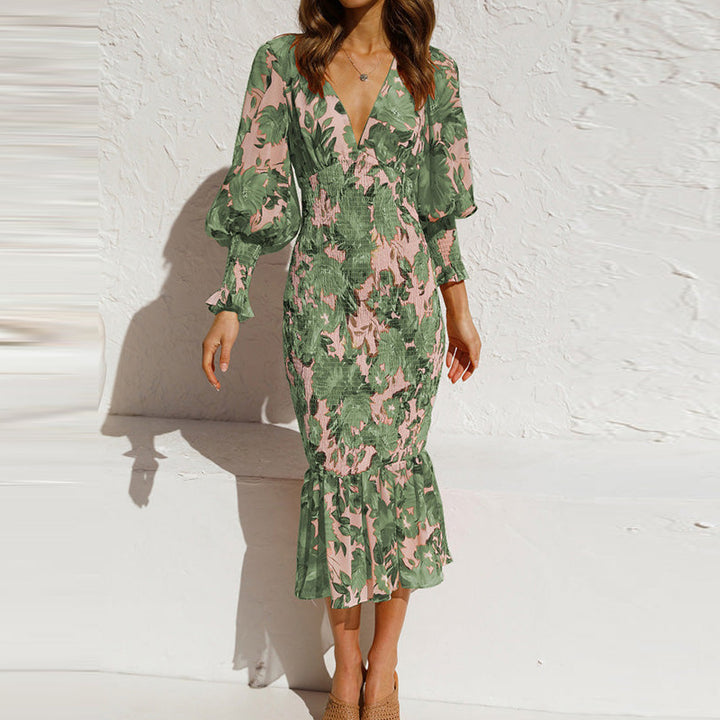 Kvinnors Bodycon klänning med volangkant och glamorös blommönster Mirla-Eva Jonsson