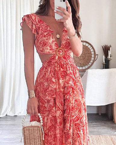Kvinnors Boho Maxi Klänning med Lekfulla Volangdetaljer och Glittrande Bälte-Eva Jonsson