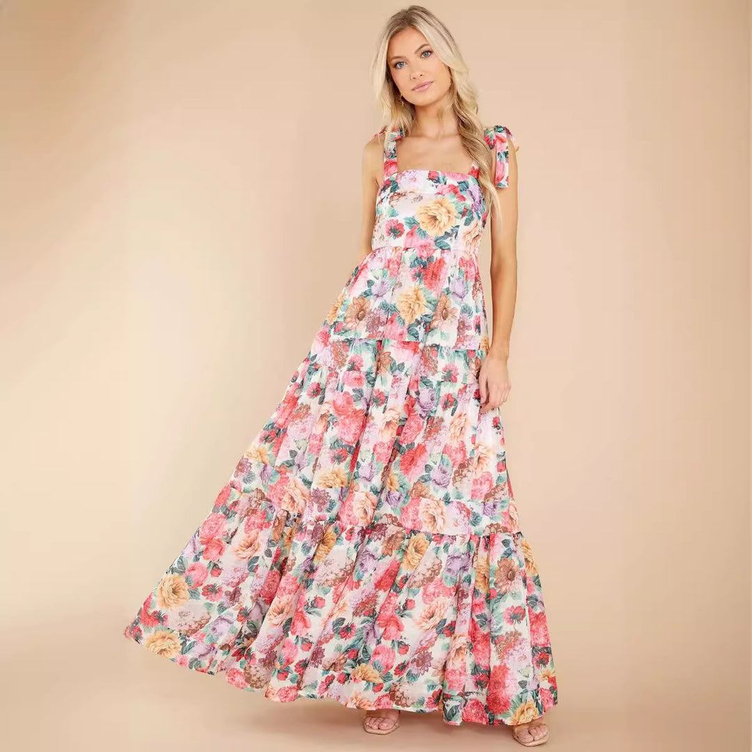 Kvinnors Boho Maxi Klänning med Lekfulla Volangdetaljer och Remmar Mirla-Eva Jonsson
