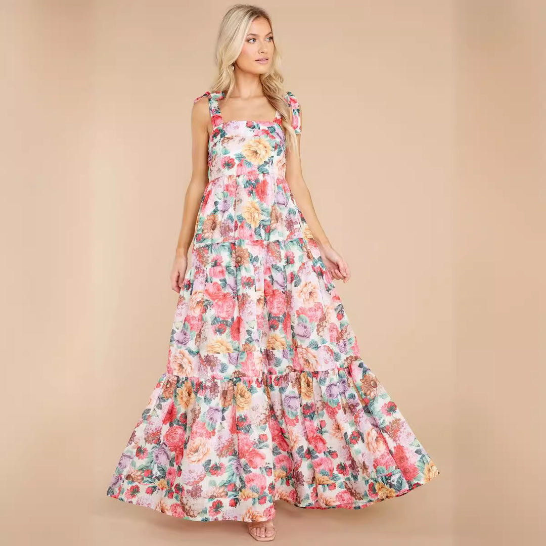 Kvinnors Boho Maxi Klänning med Lekfulla Volangdetaljer och Remmar Mirla-Eva Jonsson
