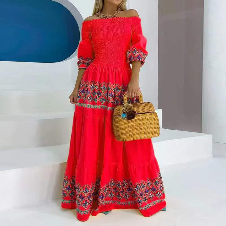 Kvinnors Boho Maxi Klänning med Off-the-Shoulder Design och Lekfull Broderi Detalj-Eva Jonsson