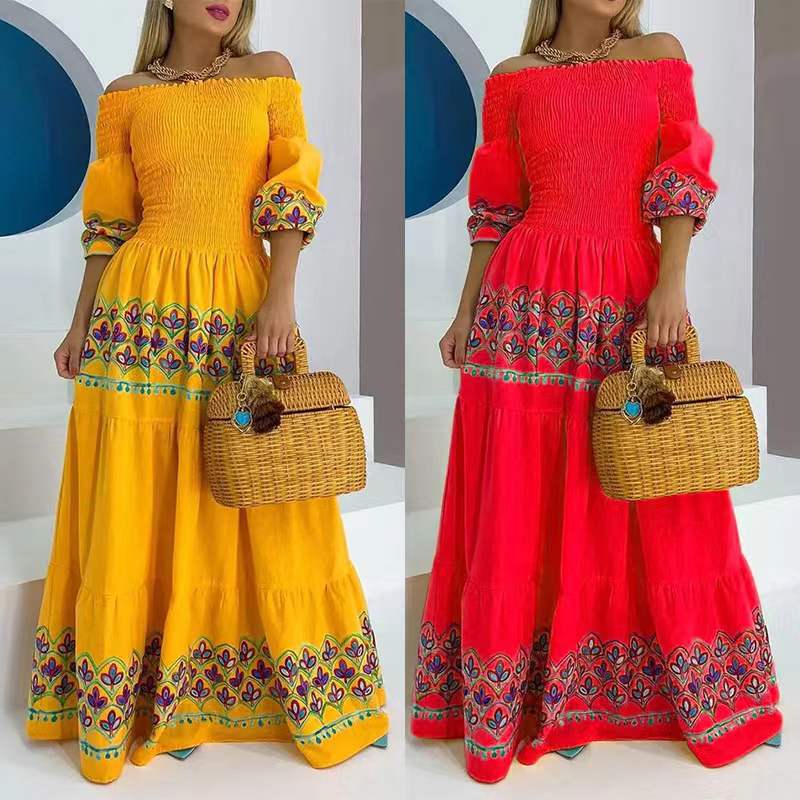 Kvinnors Boho Maxi Klänning med Off-the-Shoulder Design och Lekfull Broderi Detalj-Eva Jonsson