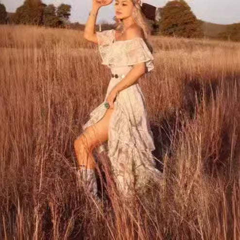 Kvinnors Boho Volangklänning med Off-the-Shoulder Design och Flödande Tyg-Eva Jonsson