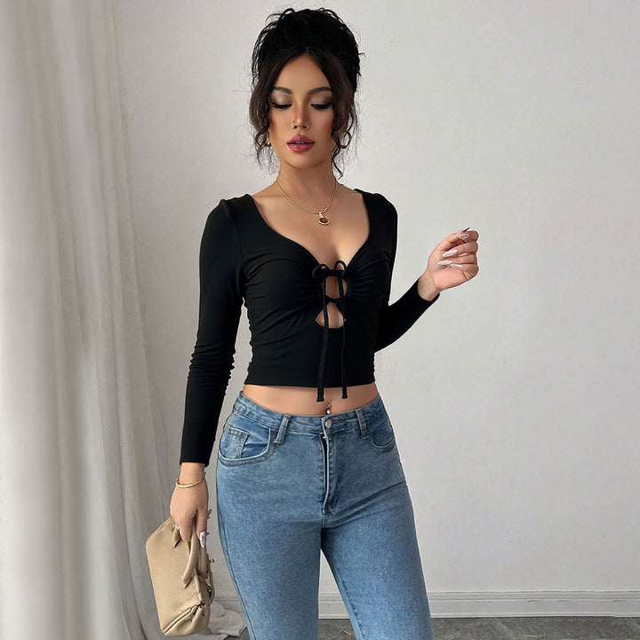 Kvinnors Crop Top med Dekorativ Knut och Lång Ärmar Mirla-Eva Jonsson
