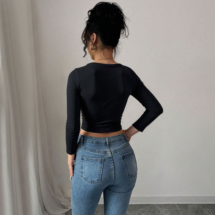 Kvinnors Cropped Top med Dekorativ Knut och Lång ärm Mirla-Eva Jonsson
