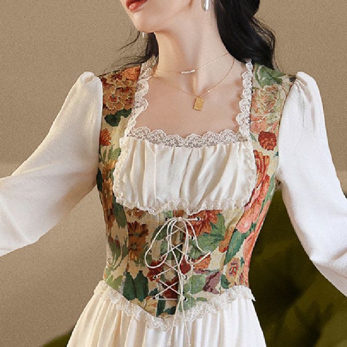Kvinnors Elegant Aftonklänning med Floral Top och Långa Ärmar-Eva Jonsson
