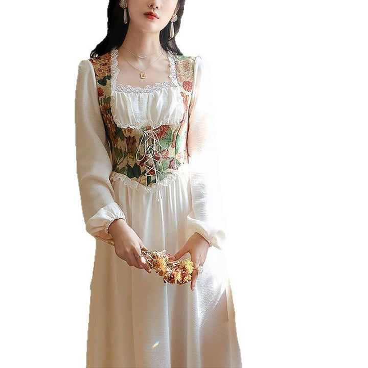 Kvinnors Elegant Aftonklänning med Floral Top och Långa Ärmar-Eva Jonsson