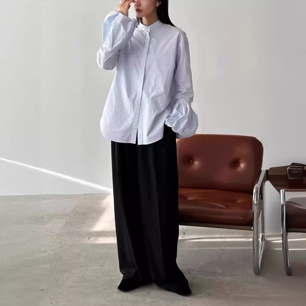 Kvinnors Elegant Blus med Voluminösa Ärmar och Höga Krage Mirla-Eva Jonsson