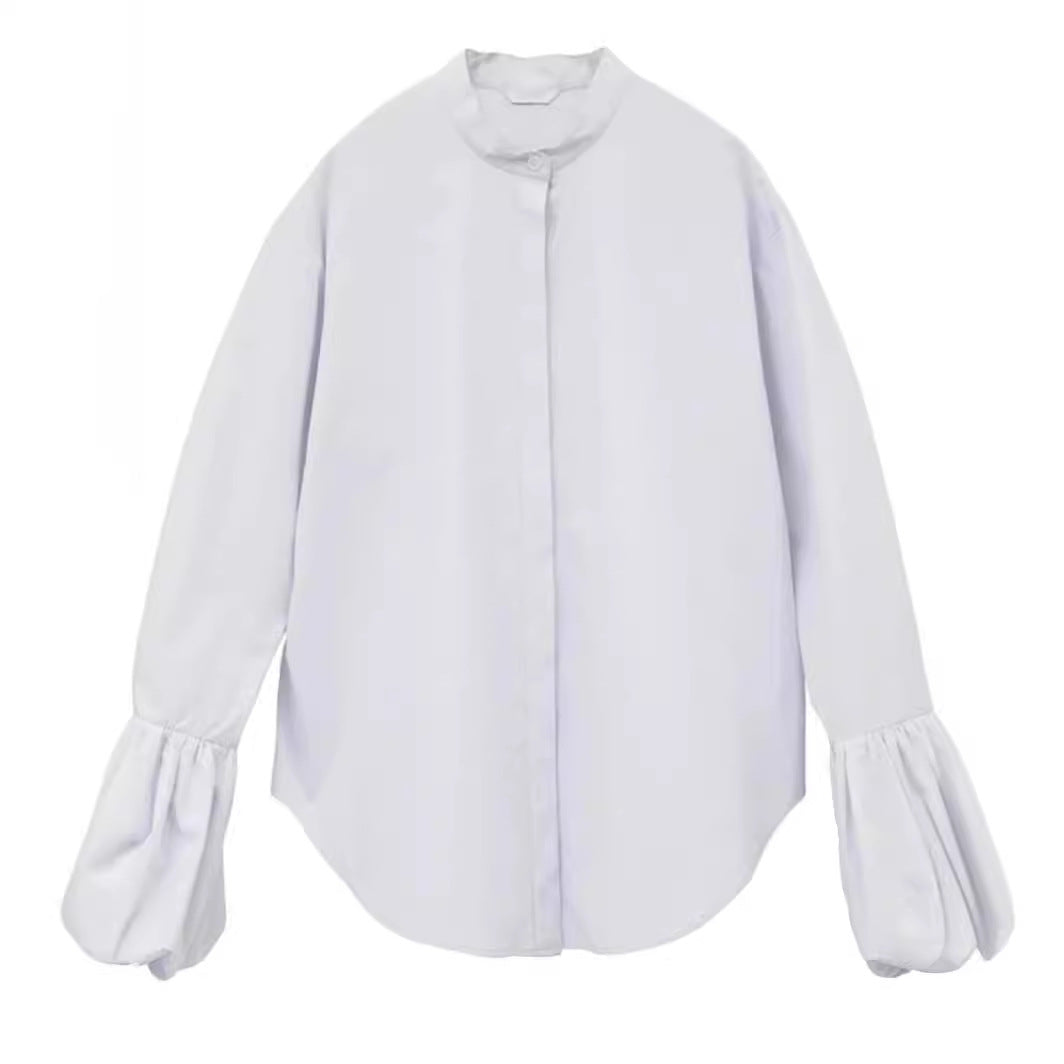 Kvinnors Elegant Blus med Voluminösa Ärmar och Höga Krage Mirla-Eva Jonsson