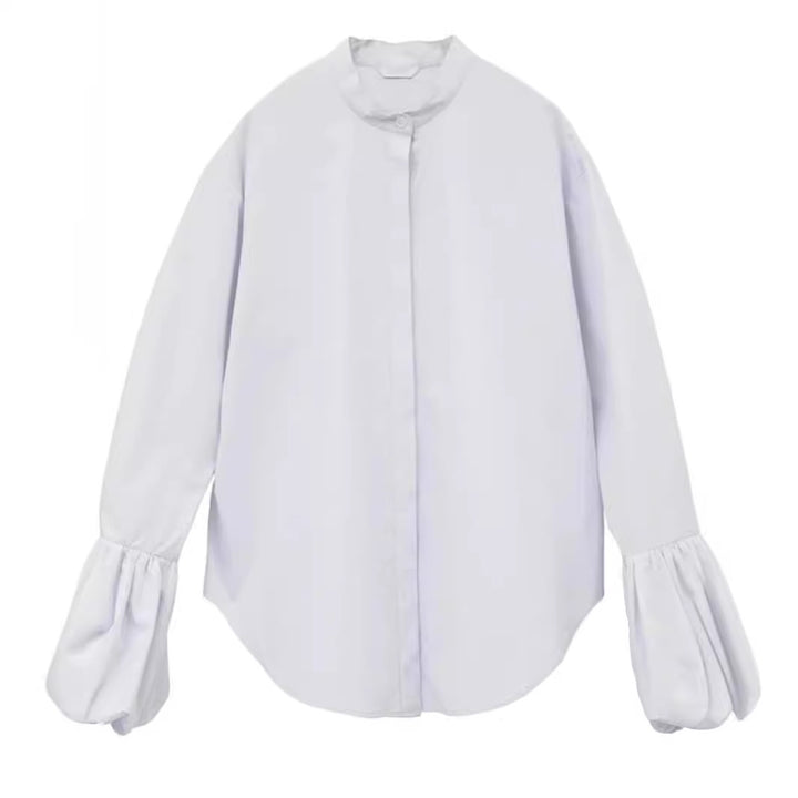 Kvinnors Elegant Blus med Voluminösa Ärmar och Höga Krage Mirla-Eva Jonsson