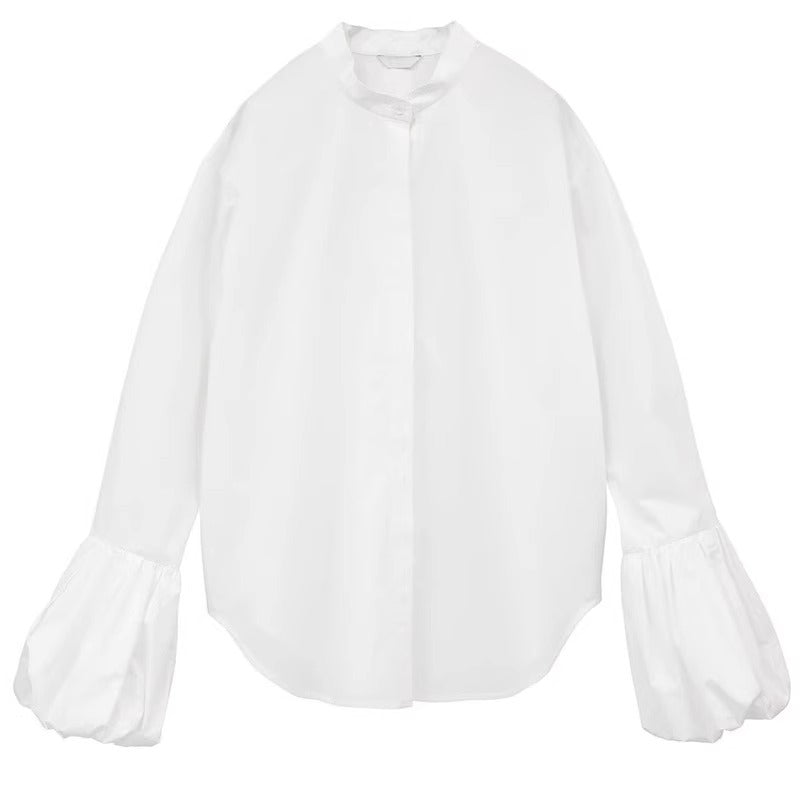 Kvinnors Elegant Blus med Voluminösa Ärmar och Höga Krage Mirla-Eva Jonsson