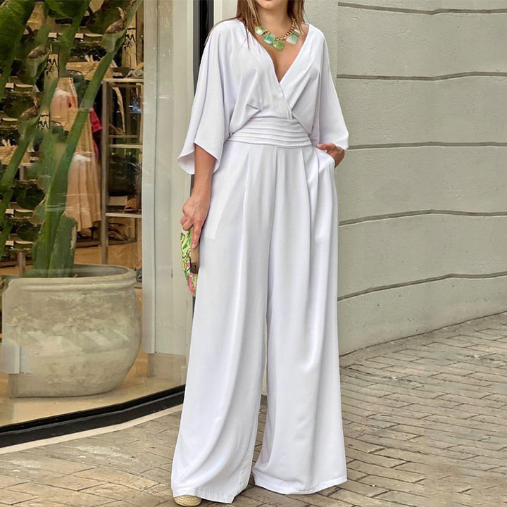 Kvinnors Elegant Högmidjad Jumpsuit med Bred Ben och Kimonoärmar Mirla-Eva Jonsson