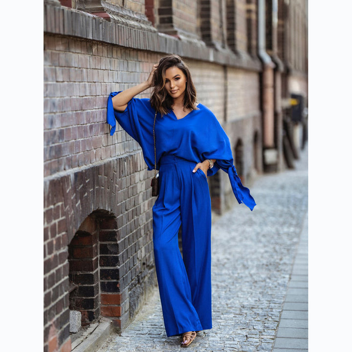 Kvinnors Elegant Jumpsuit med Breda Ärmar och Smal Midjebälte Mirla-Eva Jonsson