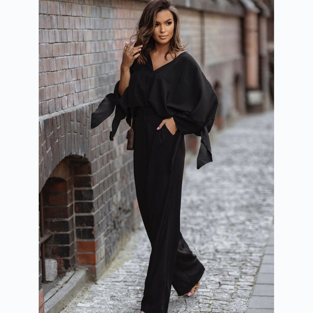 Kvinnors Elegant Jumpsuit med Breda Ärmar och Smal Midjebälte Mirla-Eva Jonsson