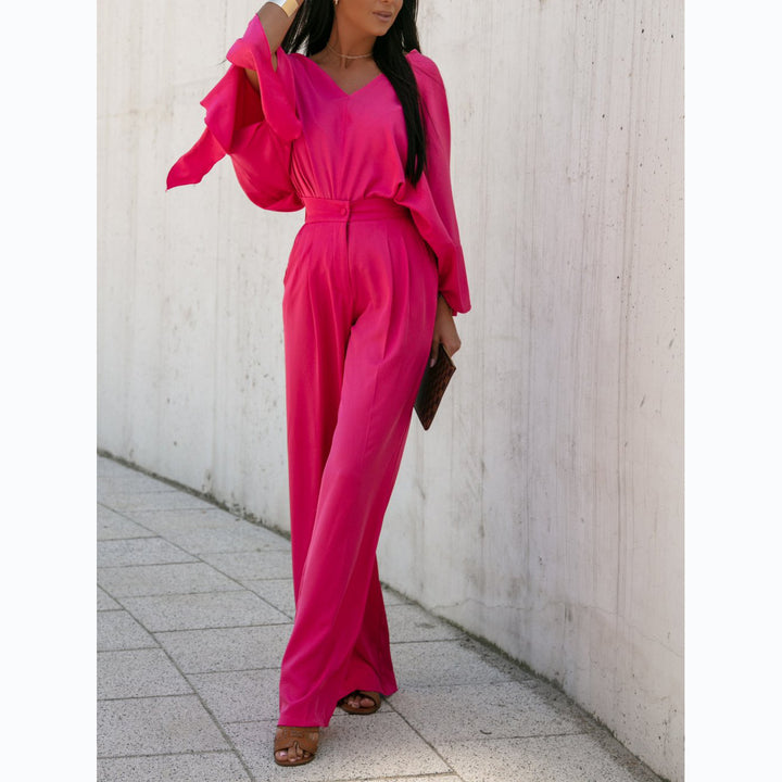Kvinnors Elegant Jumpsuit med Breda Ärmar och Smal Midjebälte Mirla-Eva Jonsson