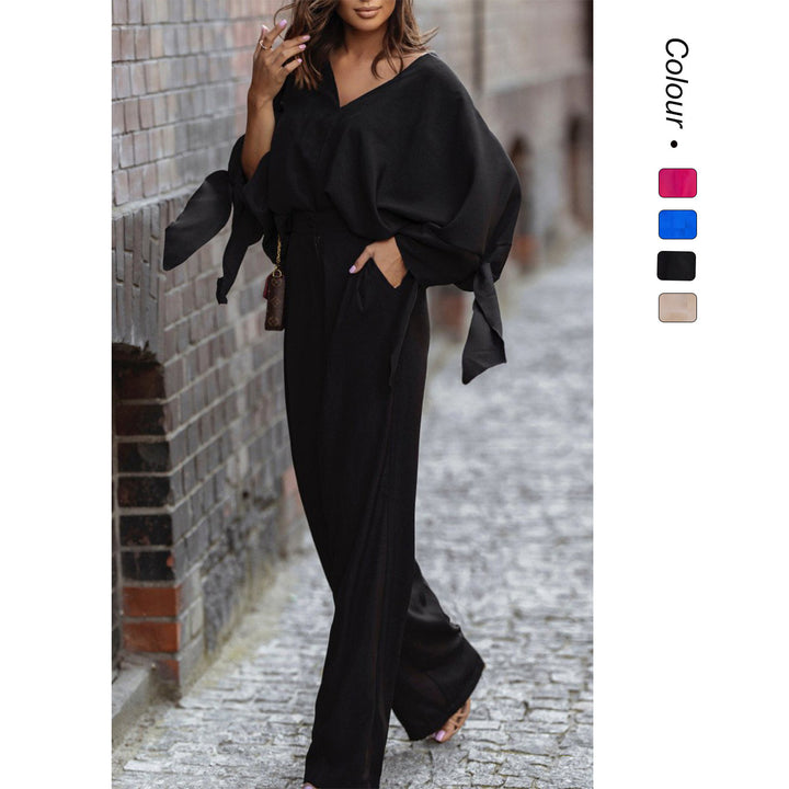 Kvinnors Elegant Jumpsuit med Breda Ärmar och Smal Midjebälte Mirla-Eva Jonsson