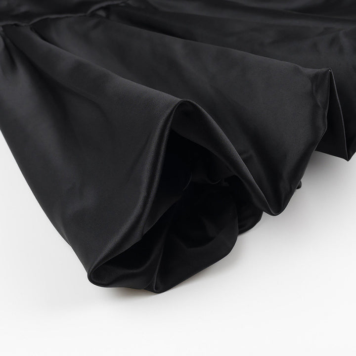 Kvinnors Elegant Klänning med Transparenta Ärmar och Hög Krage Mirla-Eva Jonsson