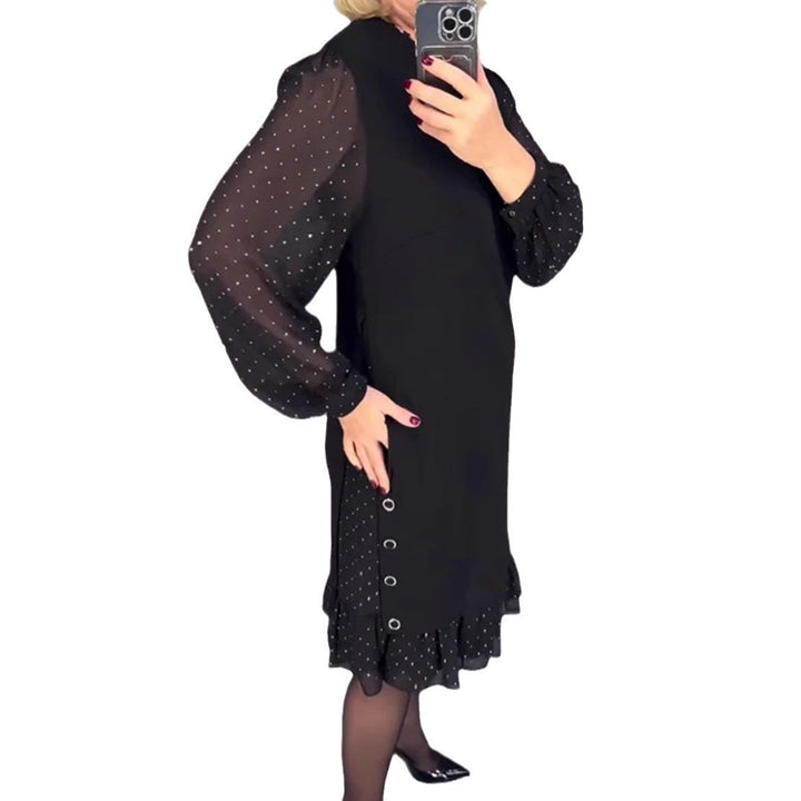 Kvinnors Elegant Klänning med Voluminösa Ärmar och Urtagen Nerder Mirla-Eva Jonsson