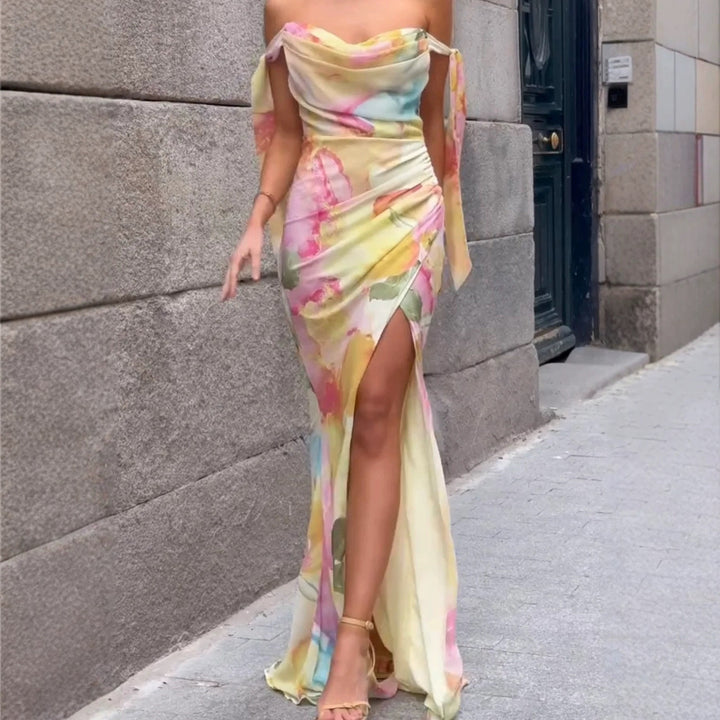 Kvinnors Elegant Maxi Klänning med Blommig Omslagsdesign och Avskuren Axel-Eva Jonsson