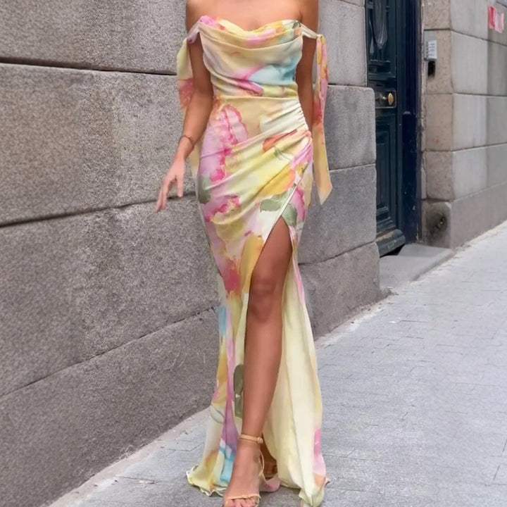 Kvinnors Elegant Maxi Klänning med Blommig Omslagsdesign och Avskuren Axel-Eva Jonsson