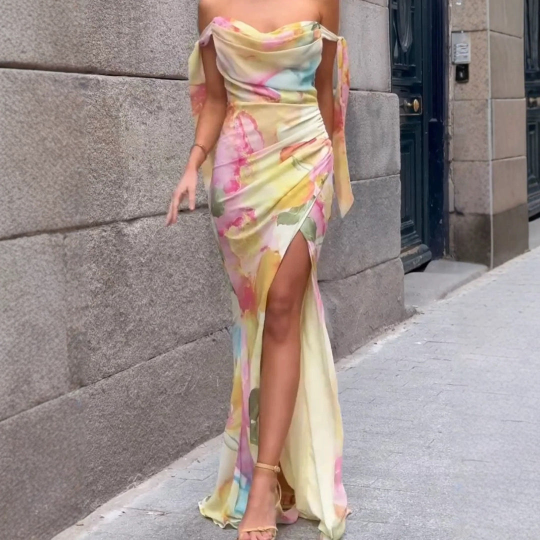 Kvinnors Elegant Maxi Klänning med Blommig Omslagsdesign och Avskuren Axel-Eva Jonsson