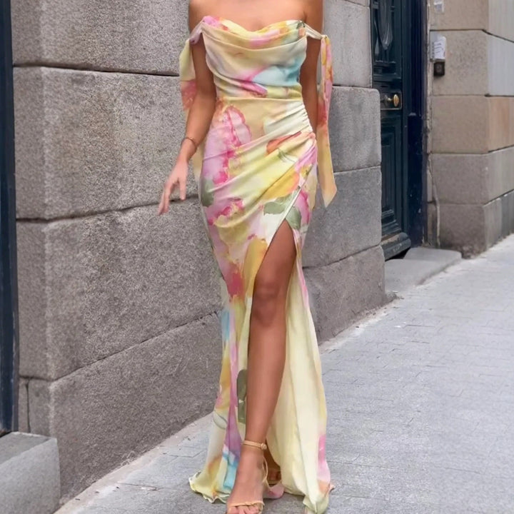 Kvinnors Elegant Maxi Klänning med Blommig Omslagsdesign och Avskuren Axel-Eva Jonsson