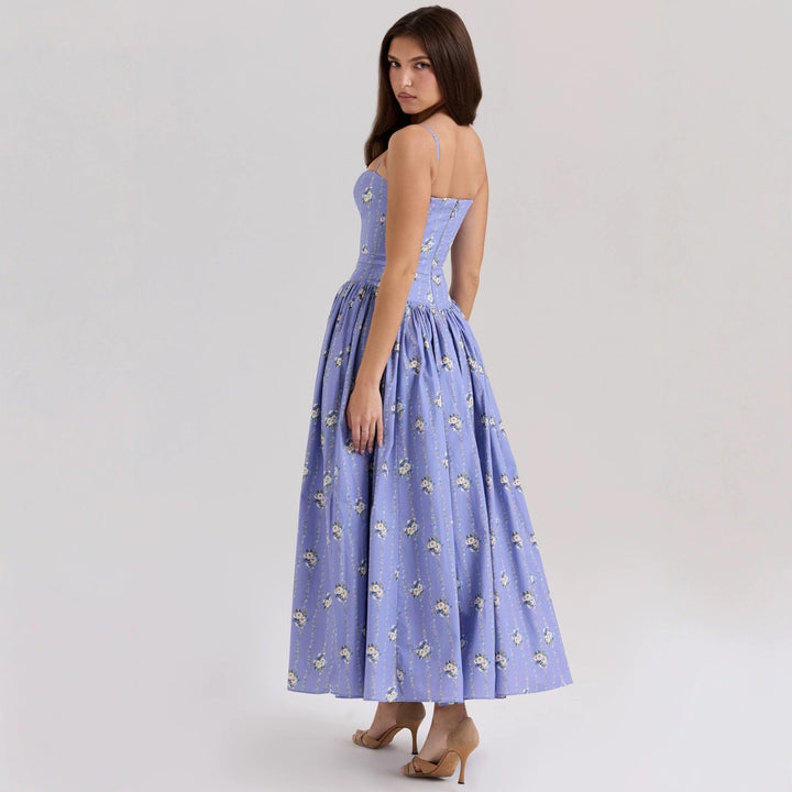 Kvinnors Elegant Maxi Klänning med Blommiga Accenter-Eva Jonsson