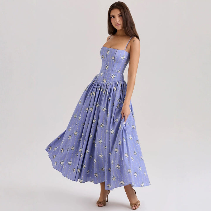 Kvinnors Elegant Maxi Klänning med Blommiga Accenter-Eva Jonsson