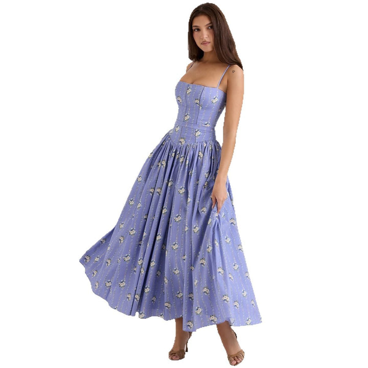 Kvinnors Elegant Maxi Klänning med Blommiga Accenter-Eva Jonsson