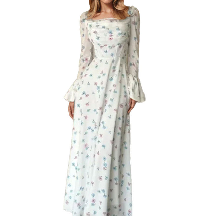 Kvinnors Elegant Maxi Klänning med Blommiga Applikationer och Voluminösa Ärmar Mirla-Eva Jonsson